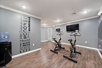 Fitness center with free weights and spin room